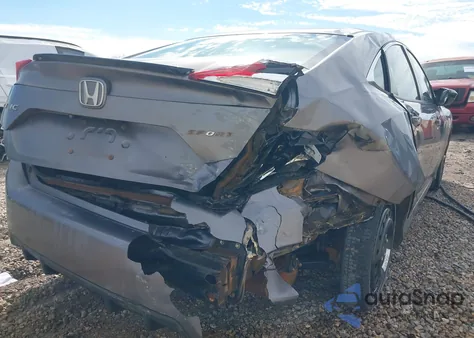 2019 Honda Civic Sport z USA, uszkodzony, nr VIN 19XFC2F86KE007104